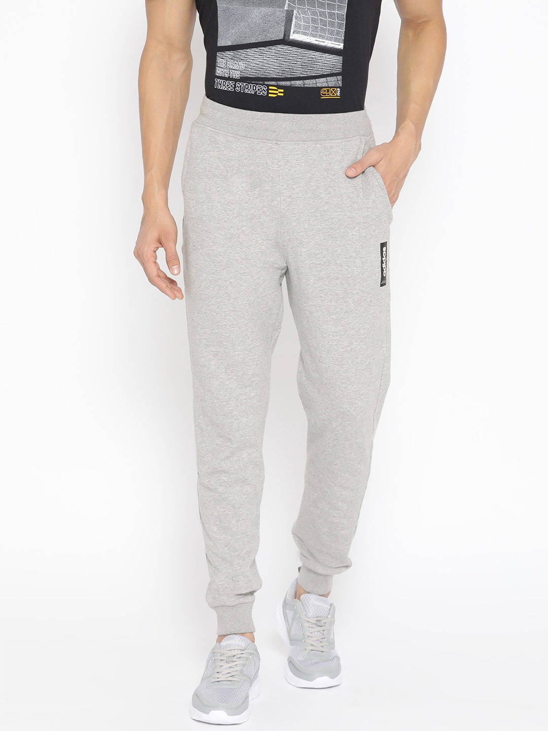 black and grey track pants