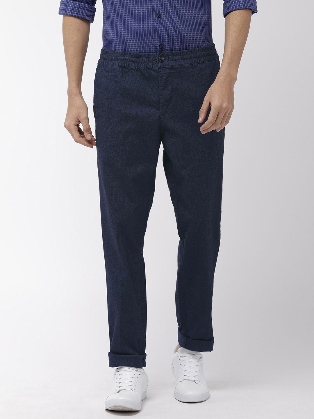 Buy Tommy Hilfiger Men Navy Blue Regular Fit Solid Regular Trousers ...