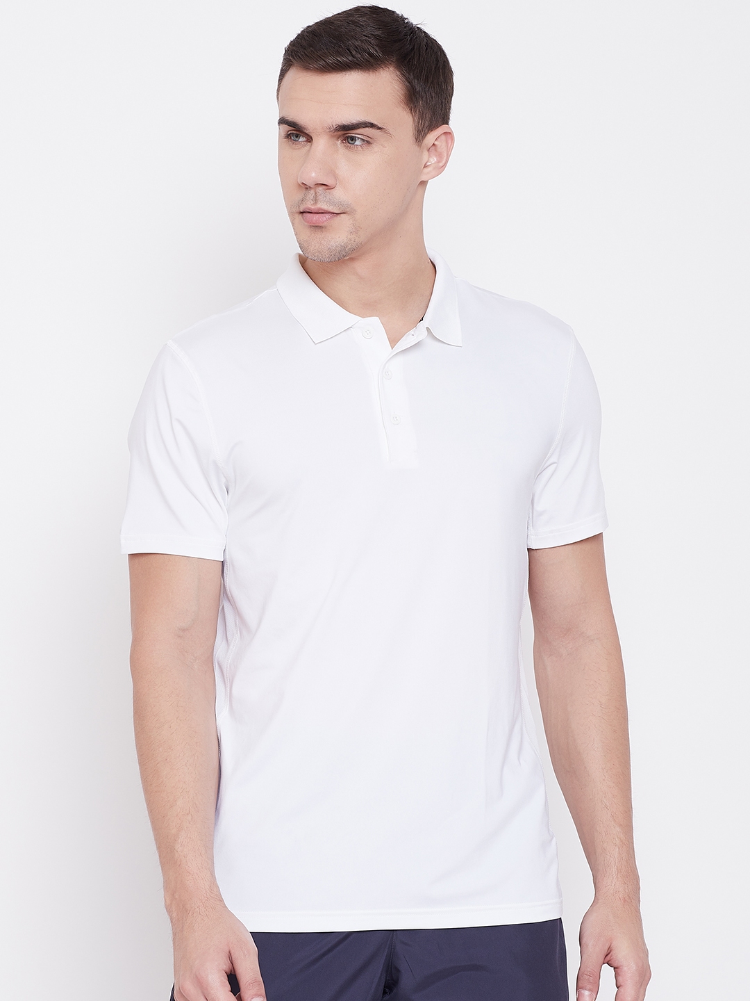 Buy Reebok Men White Solid Polo Collar T Shirt - Tshirts for Men ...