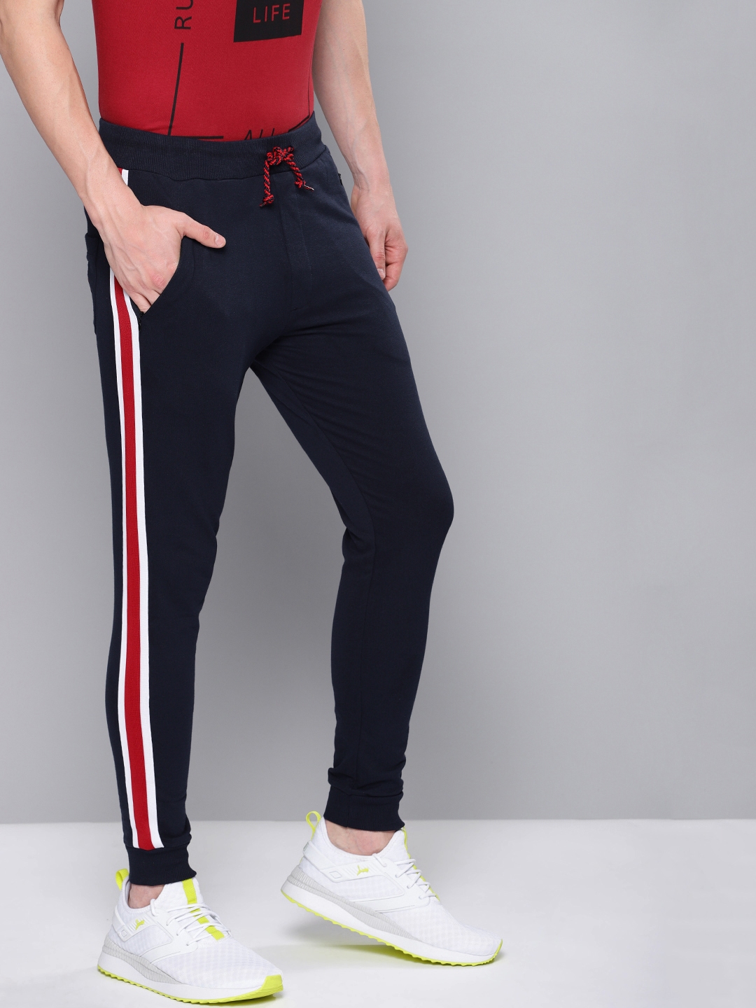 difference between track pants and trousers