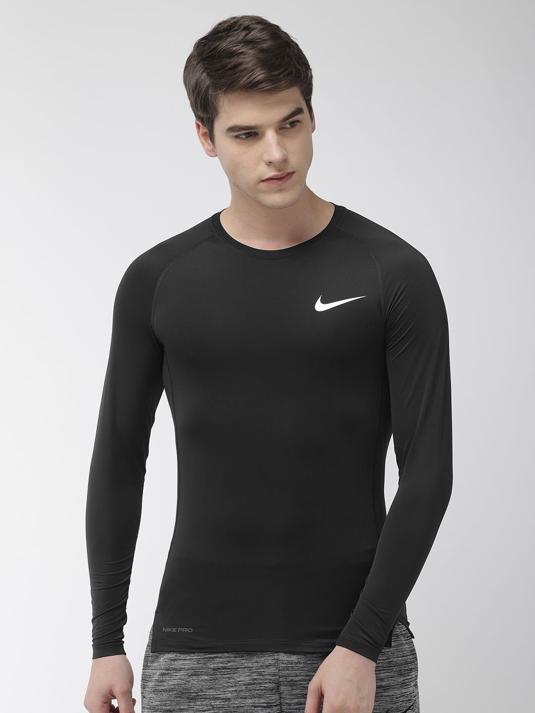 Buy Nike Men Black Solid AS M NP LS TIGHT Dri Fit Round Neck Training T ...