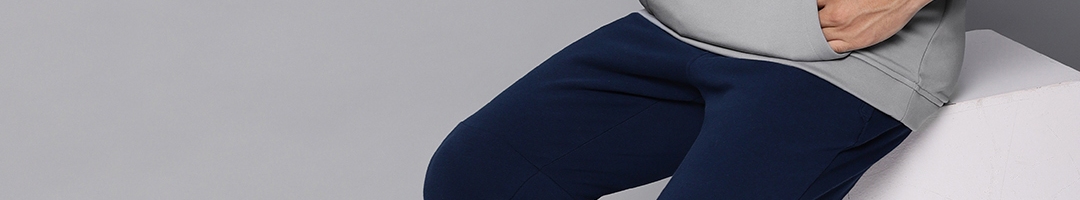 Buy UNDER ARMOUR Men Grey Hooded Performance Fleece Graphic Self Design ...