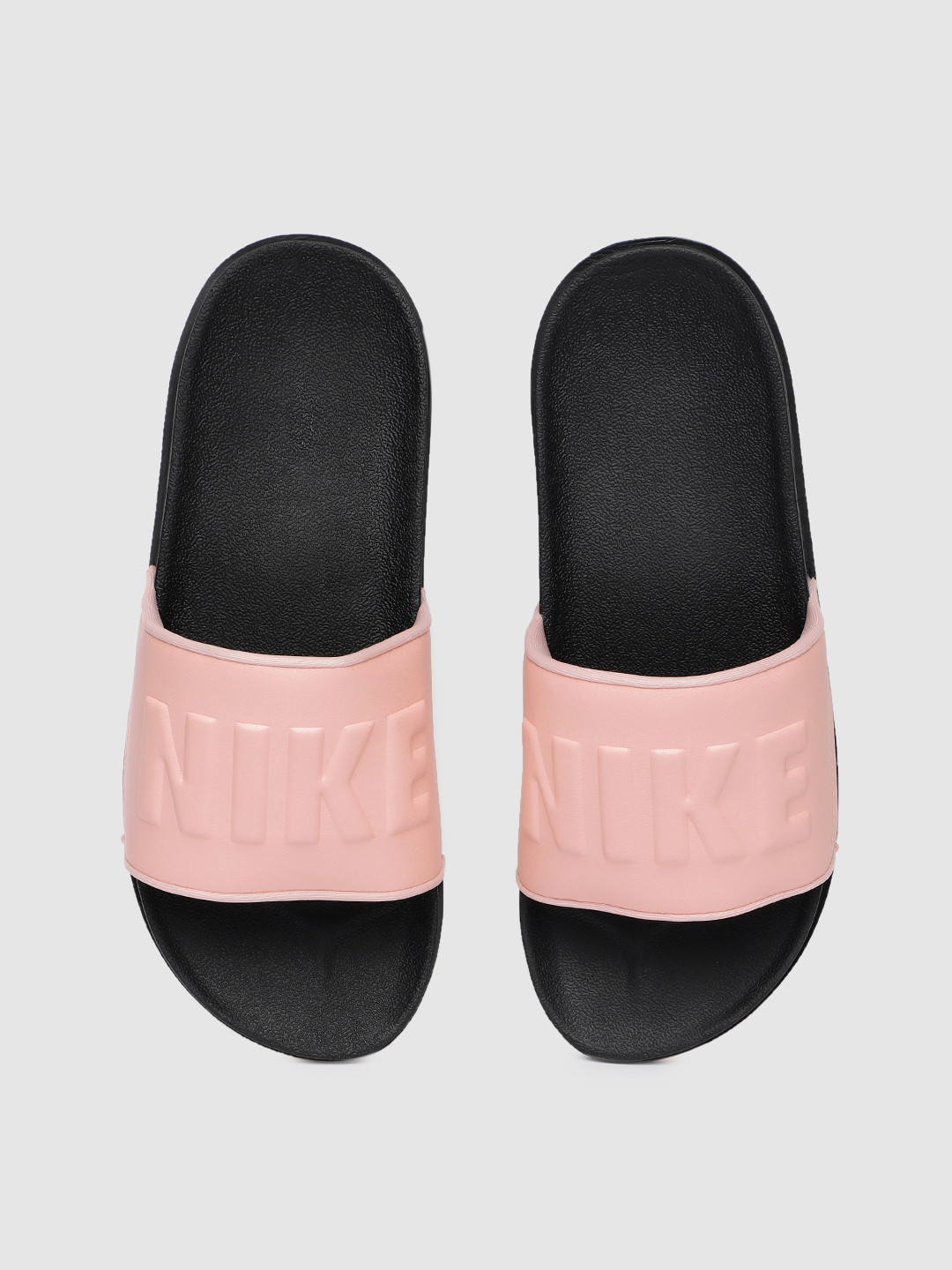 peach nike slides