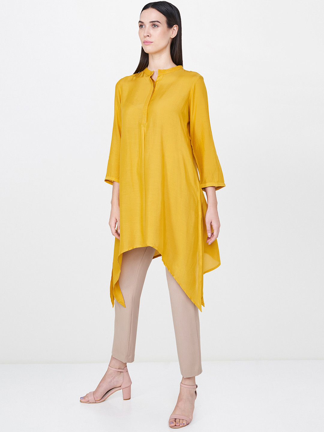 Buy AND Women Mustard Yellow Solid Asymmetric Hem A Line Tunic Tunics
