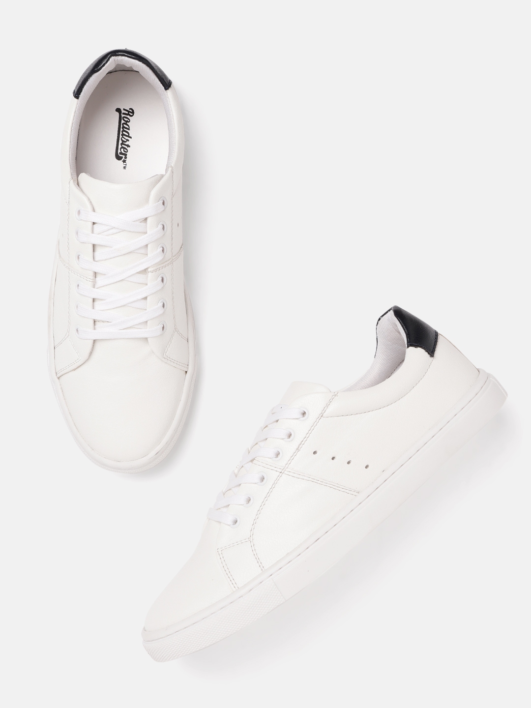 ucb white sneakers myntra