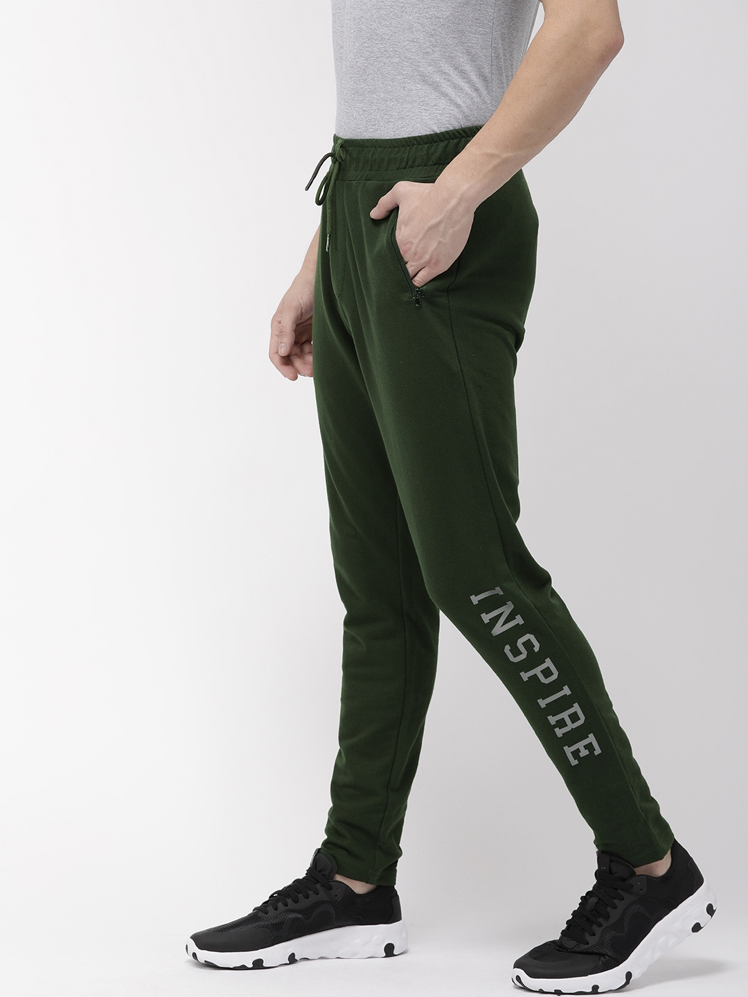 black and green track pants