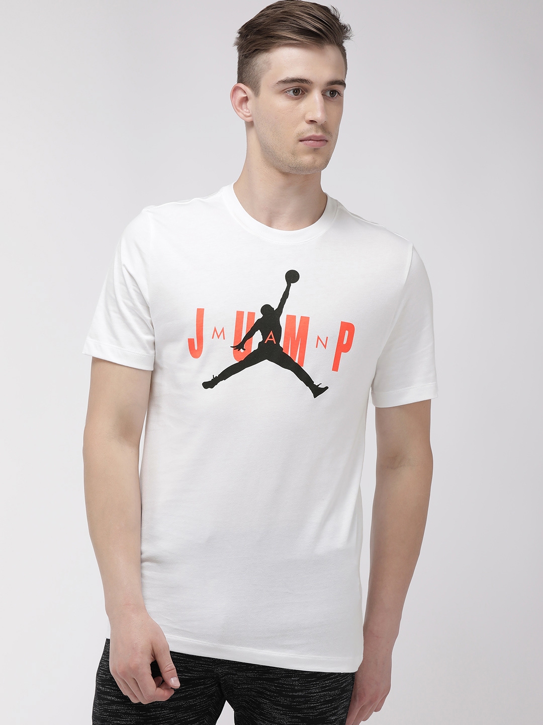 Buy Nike Men White Printed Standard Fit Round Neck M J CTN SS JUMP CREW ...