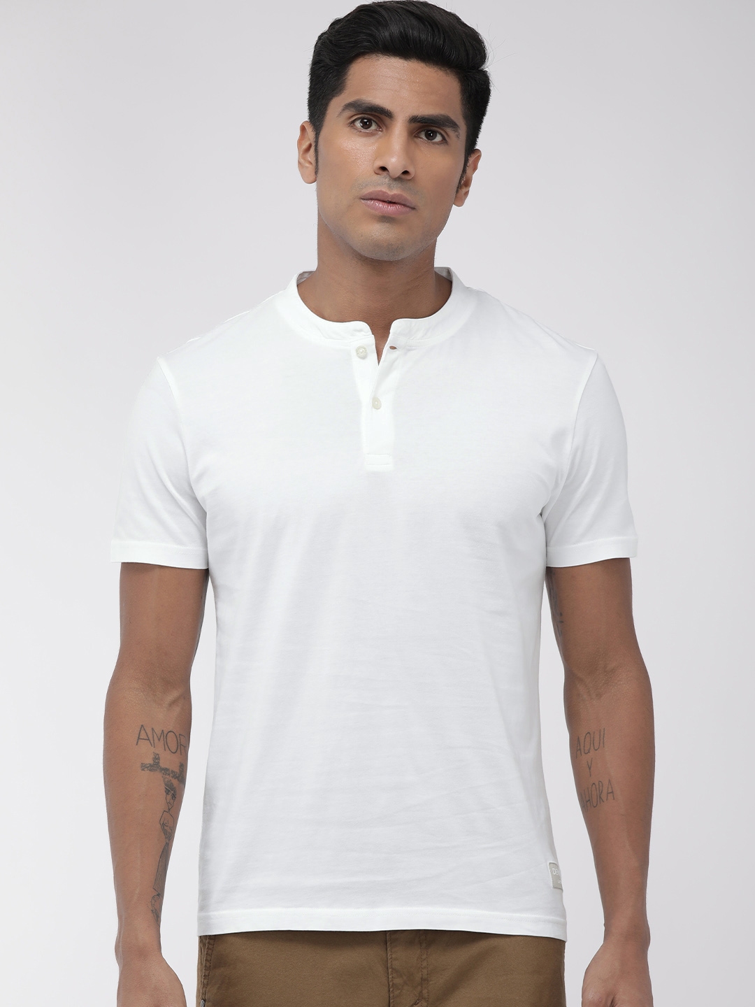 Buy Denizen From Levis Men White Solid Henley Neck Pure Cotton T Shirt ...