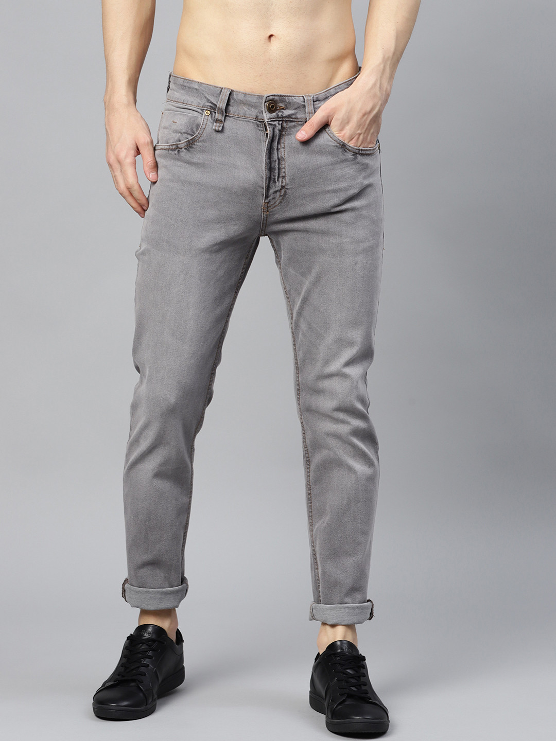 Buy Roadster Men Grey Slim Fit Mid Rise Clean Look Stretchable Jeans ...