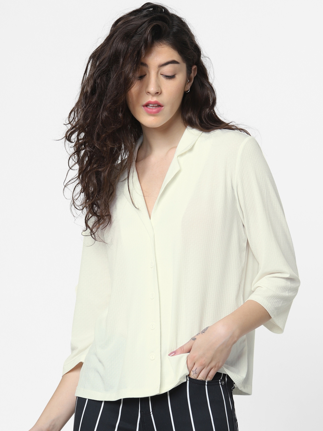 cream coloured blouse