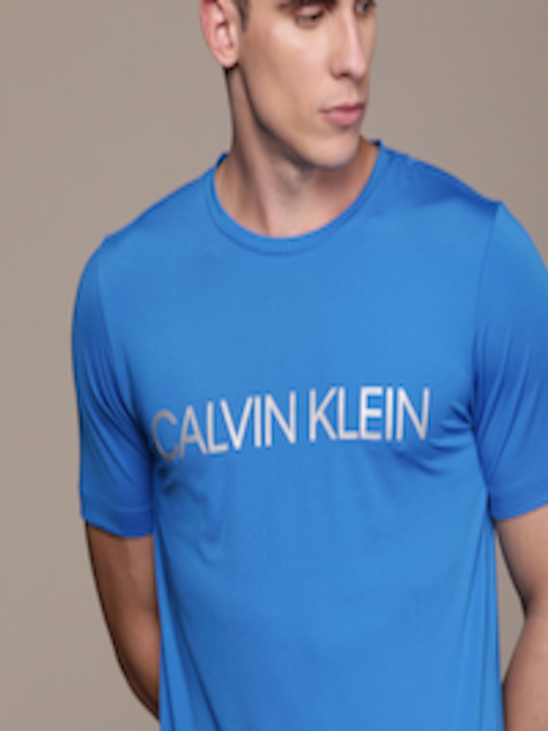 Buy Calvin Klein Jeans Men Blue Solid Round Neck T Shirt With Printed ...
