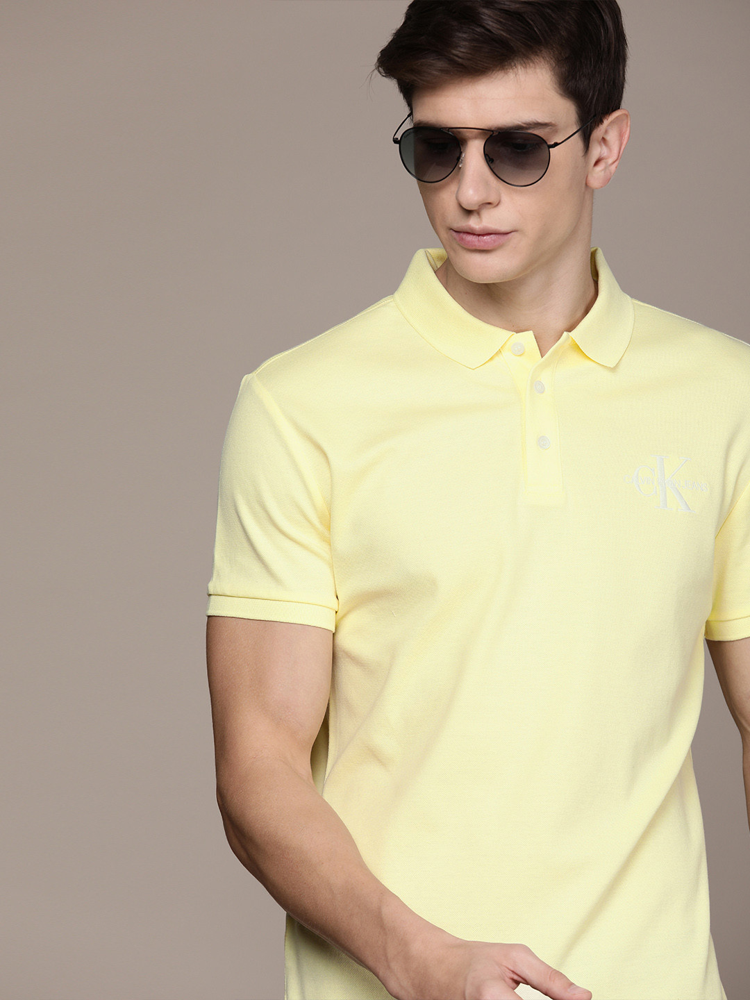 Buy Calvin Klein Jeans Men Yellow Solid Polo Collar Pure Cotton T Shirt
