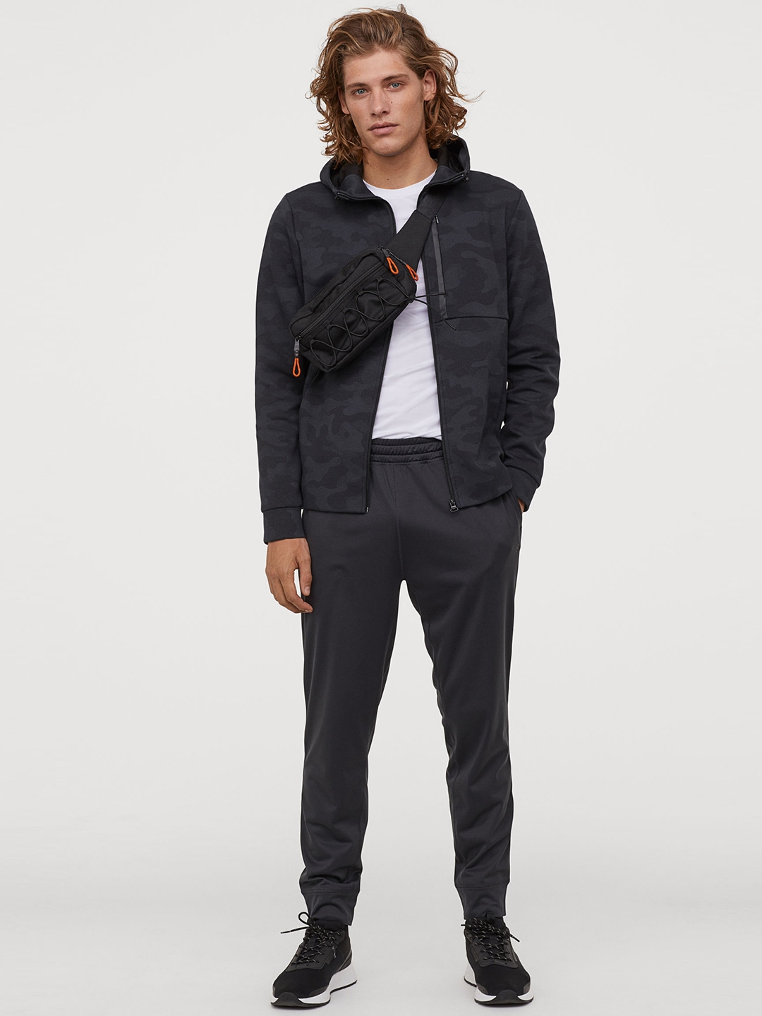grey sports trousers
