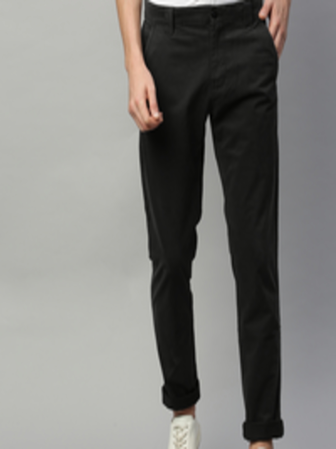 Buy Tommy Hilfiger Men Black Slim Fit Solid Chinos - Trousers for Men ...