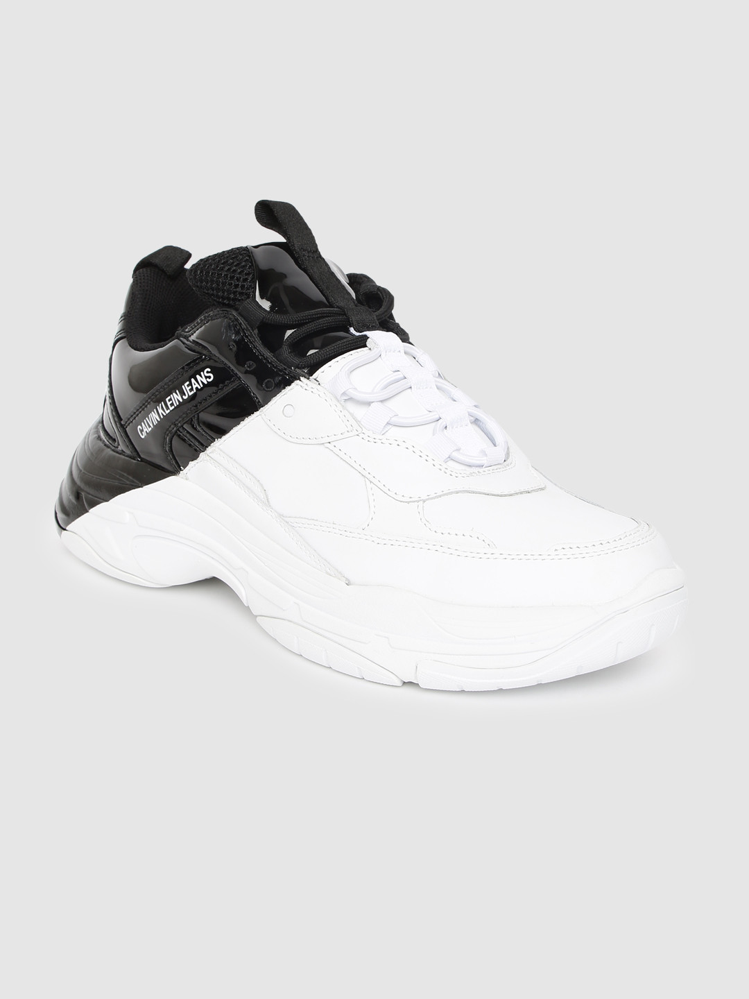 Buy Calvin Klein Men White & Black Colourblocked Sneakers Buy Calvin Klein Men White & Black Colourblocked Sneakers
