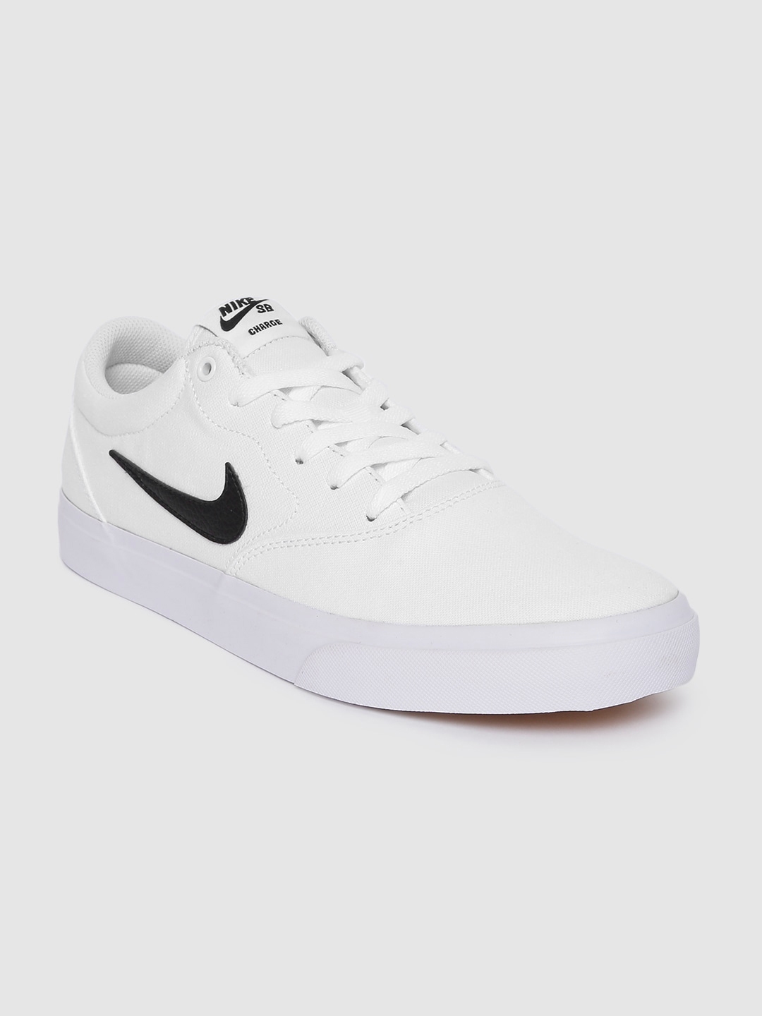 nike sb charge white canvas