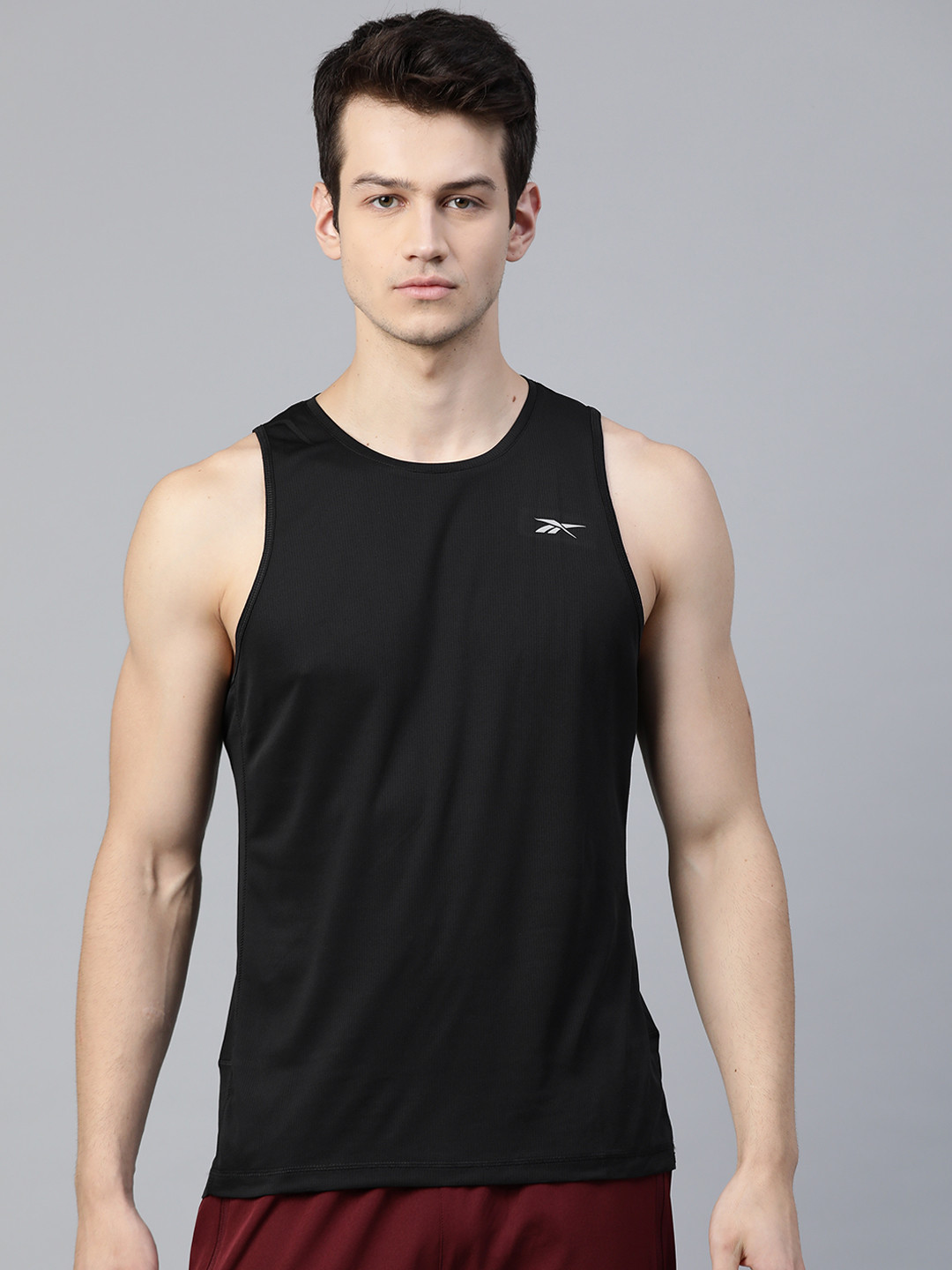 Buy Reebok Men Black RE Speedwick Singlet Solid Innerwear Vest