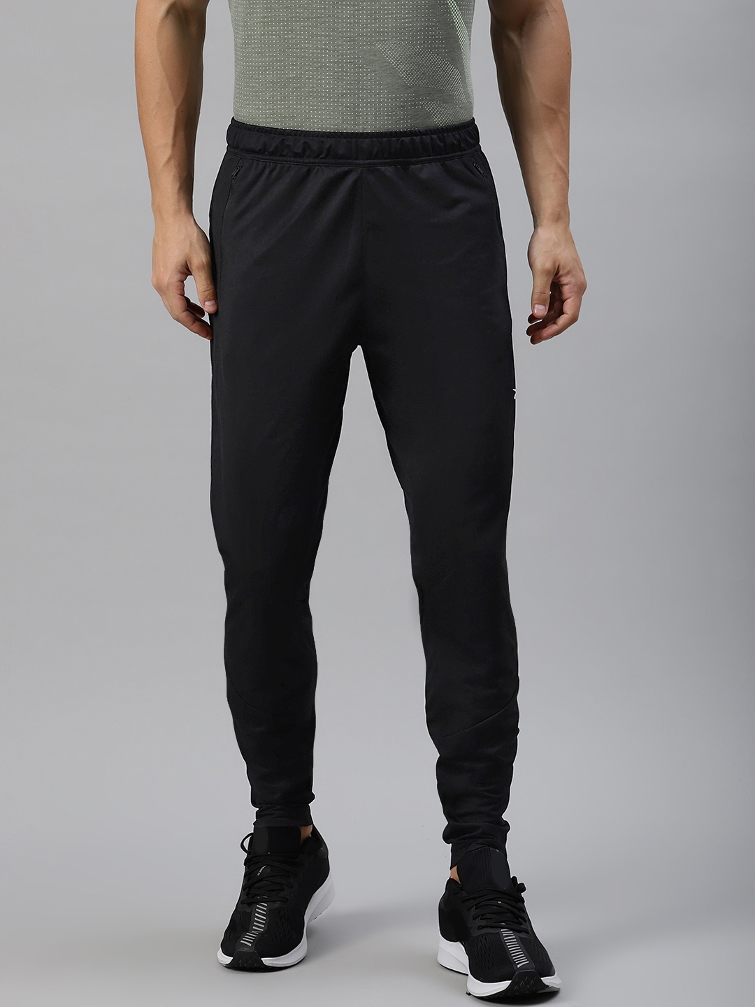 Buy Reebok Men Black Solid Slim Fit TS Speedwick Knitted Training ...