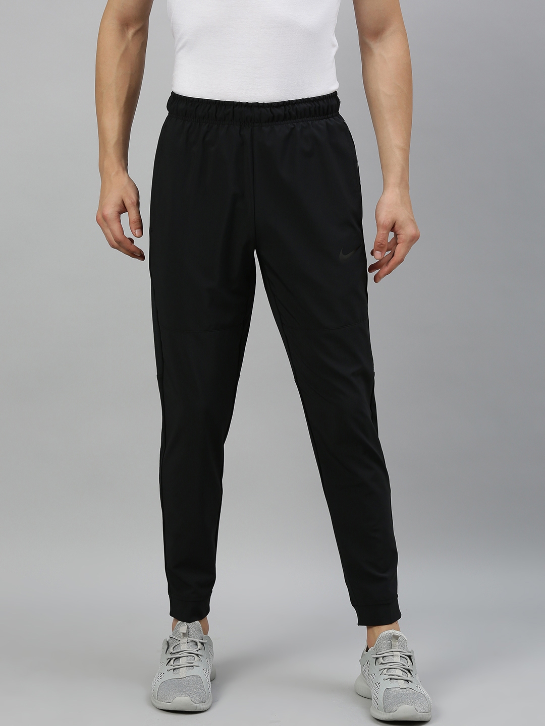 Buy Nike Men Black Solid Straight Fit AS TPR LV NFS Dri Fit Track Pants - Track Pants for Men ...