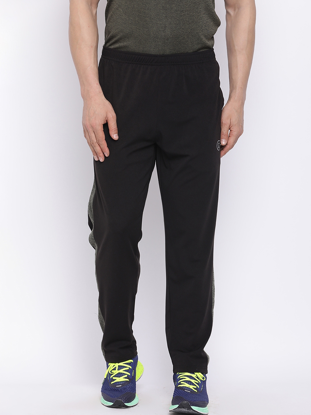 black and neon green track pants