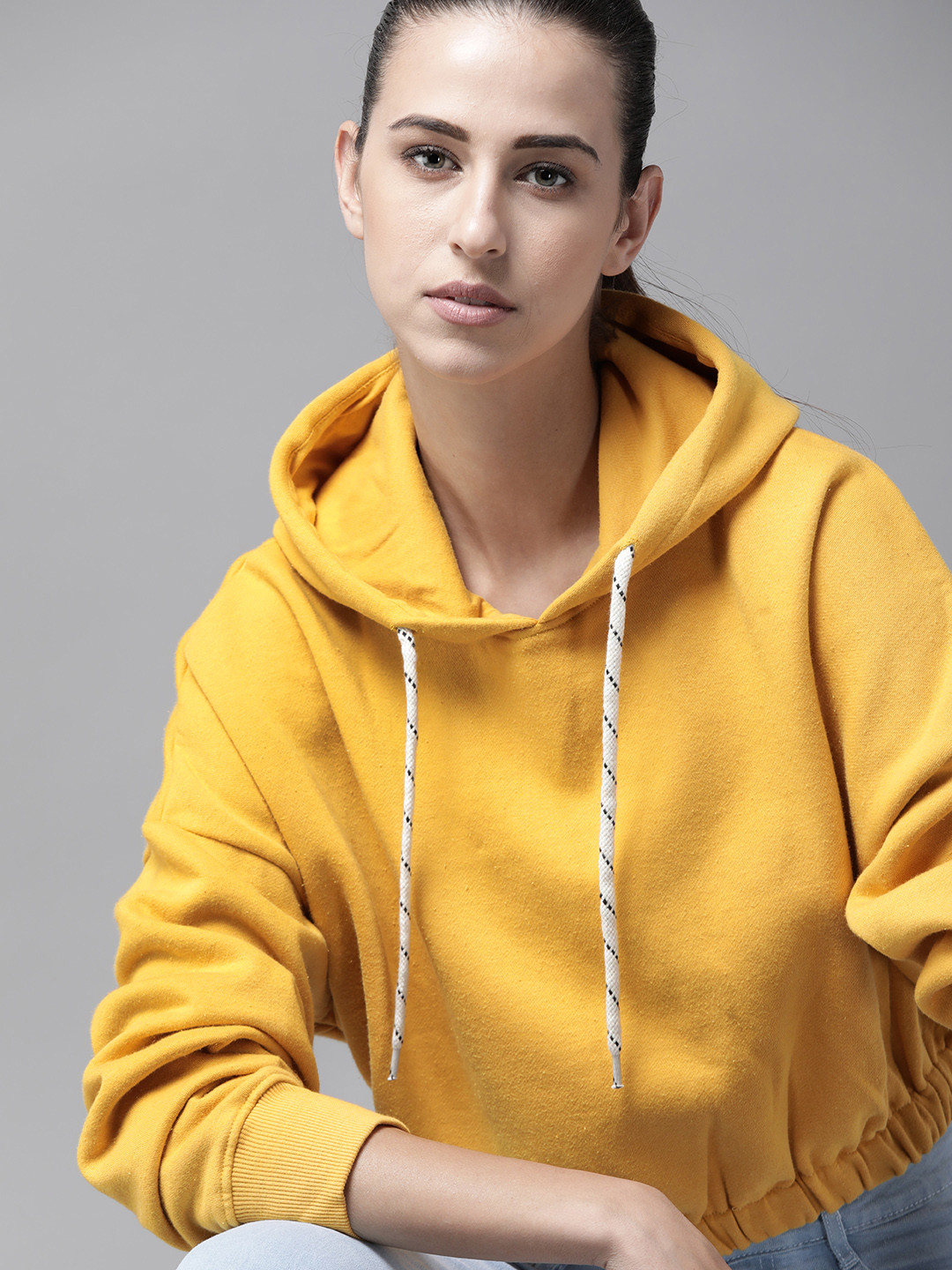 Buy Roadster Women Mustard Yellow Solid Hooded Sweatshirt Sweatshirts