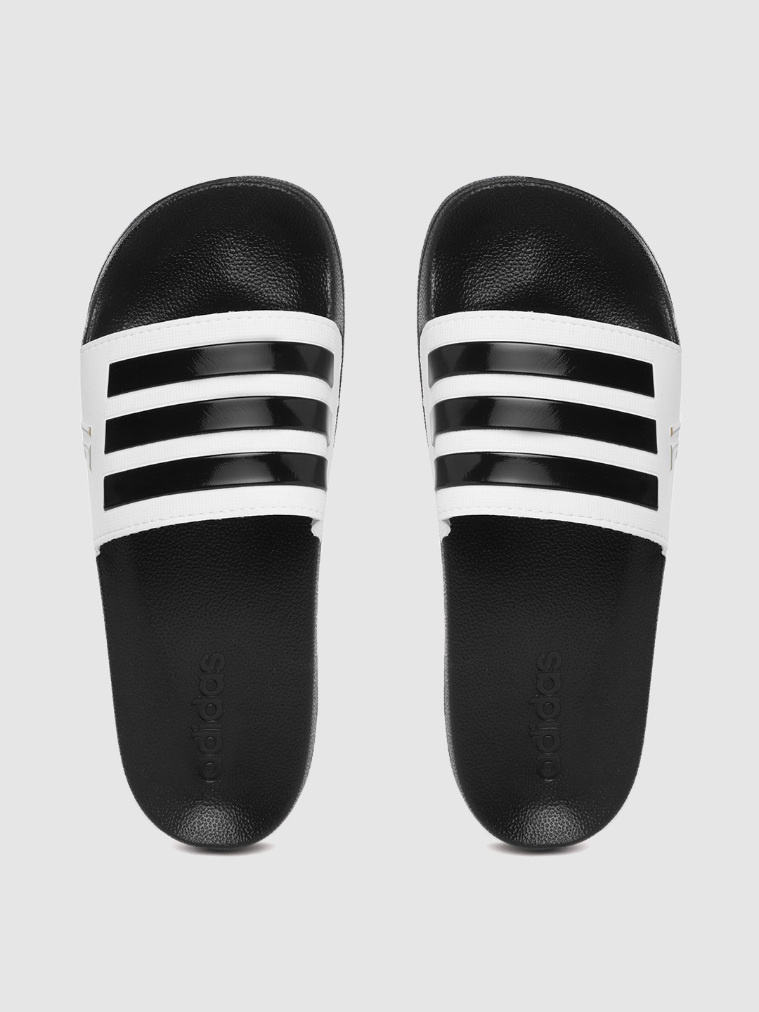 Buy ADIDAS Men Black & White Striped Adilette Sliders - Flip Flops for Men 12031736 | Myntra