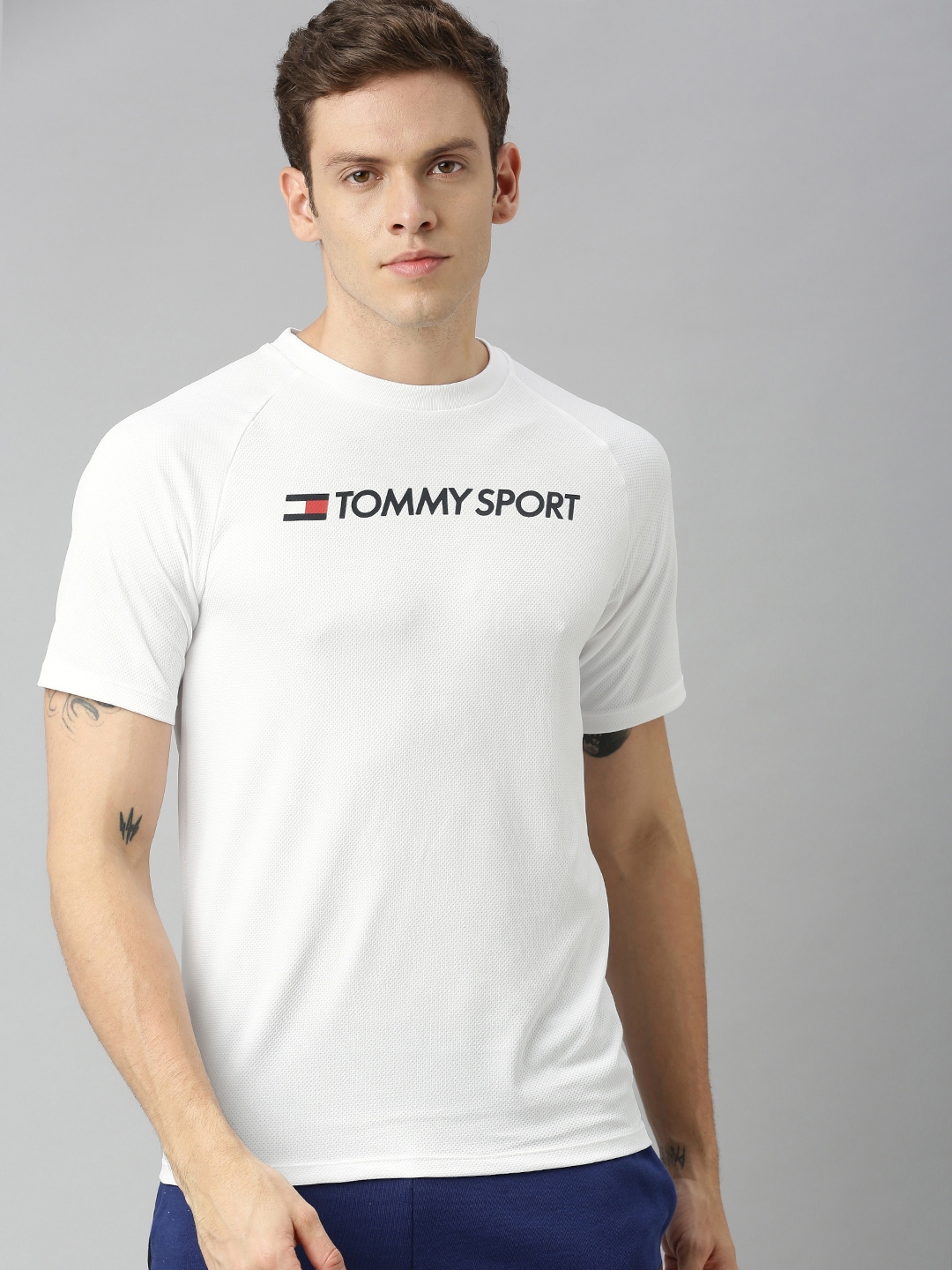Buy Tommy Hilfiger Men White Solid Round Neck T Shirt - Tshirts for Men ...