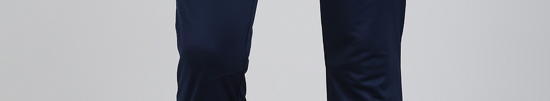 Buy Reebok Men Navy Blue Solid WOR KNIT Slim Fit Track Pants - Track ...
