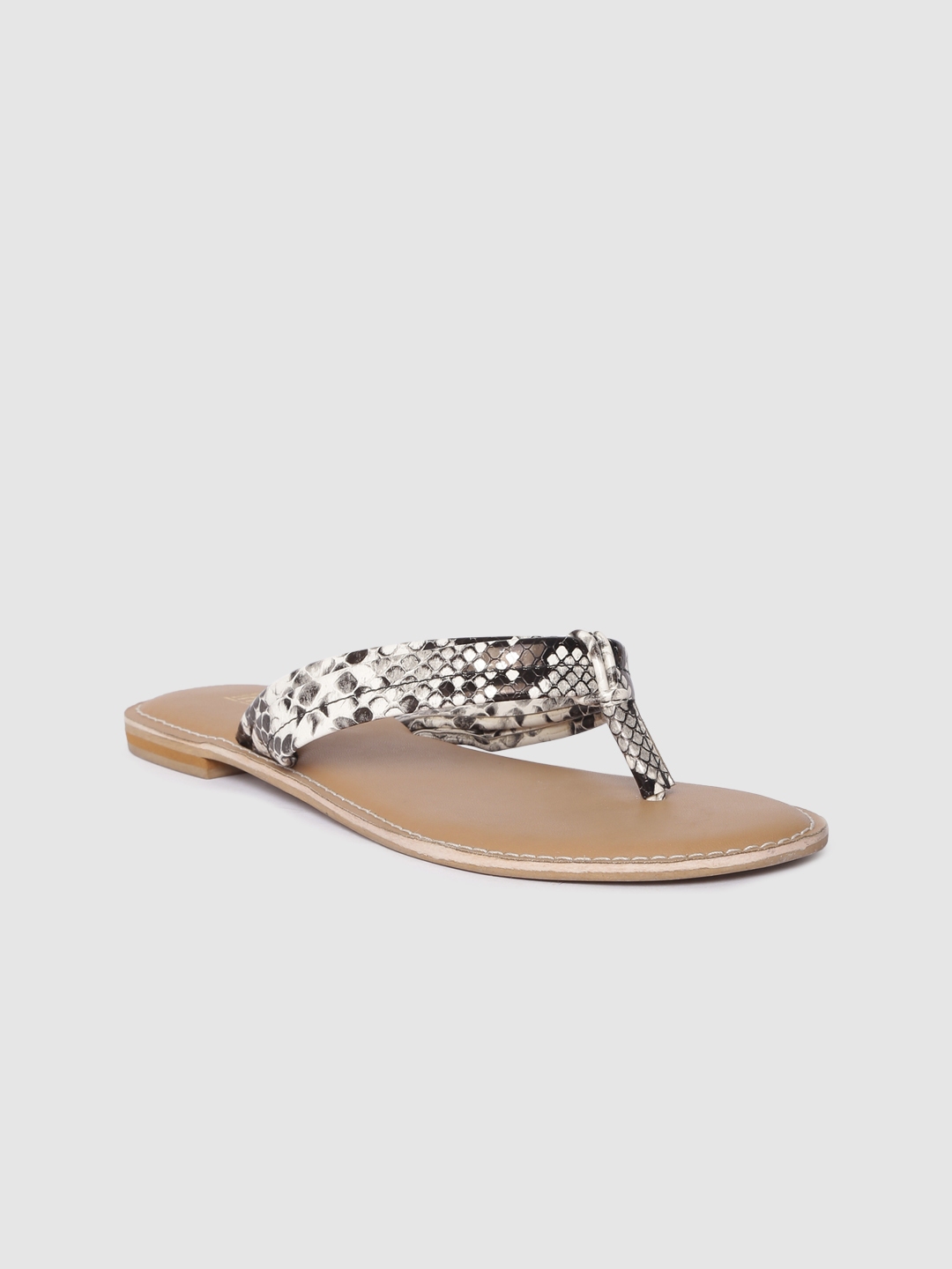 black and white snakeskin flats