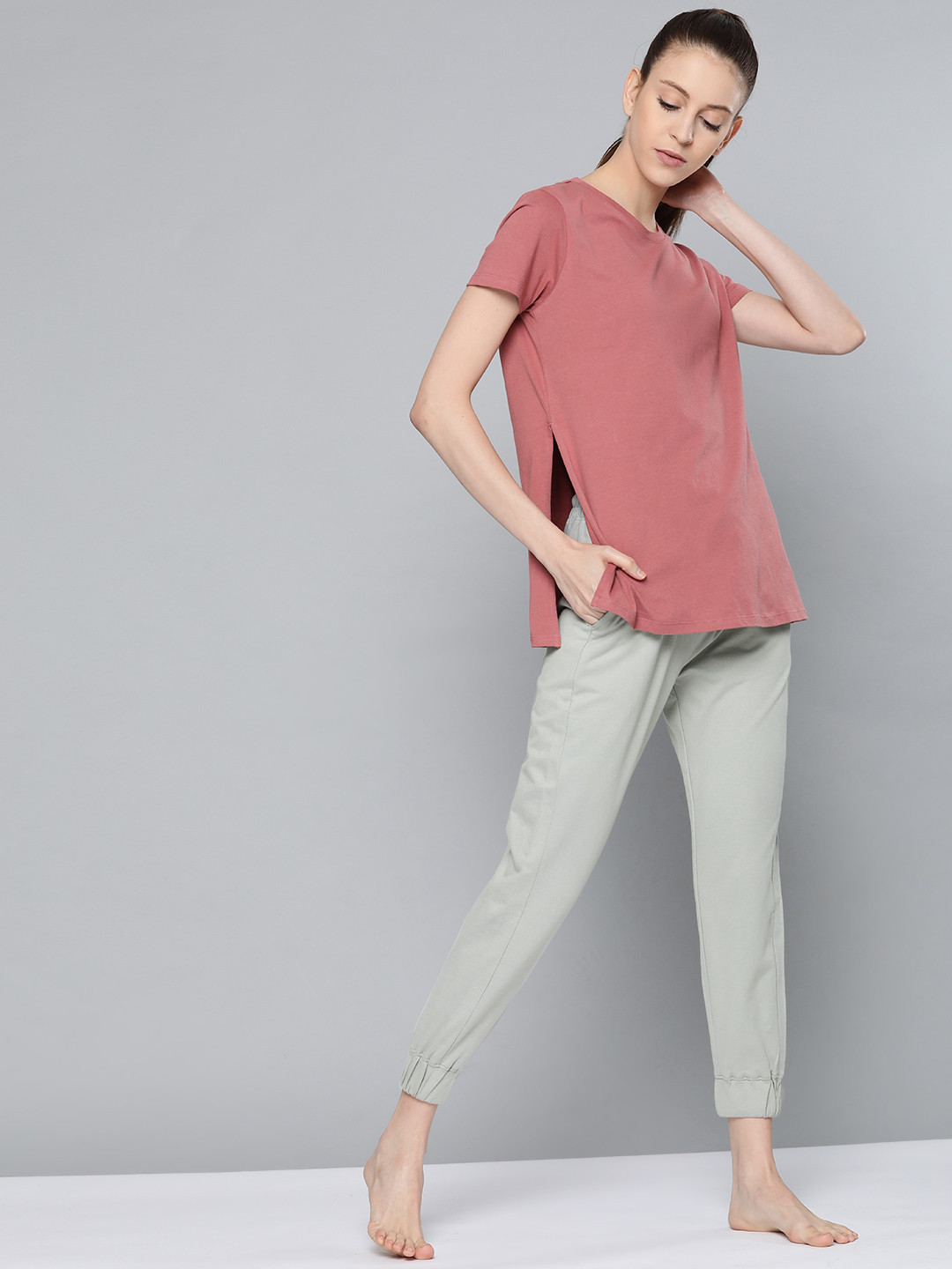 Buy HRX By Hrithik Roshan Women Limestone Solid Tapered Fit Bio Wash