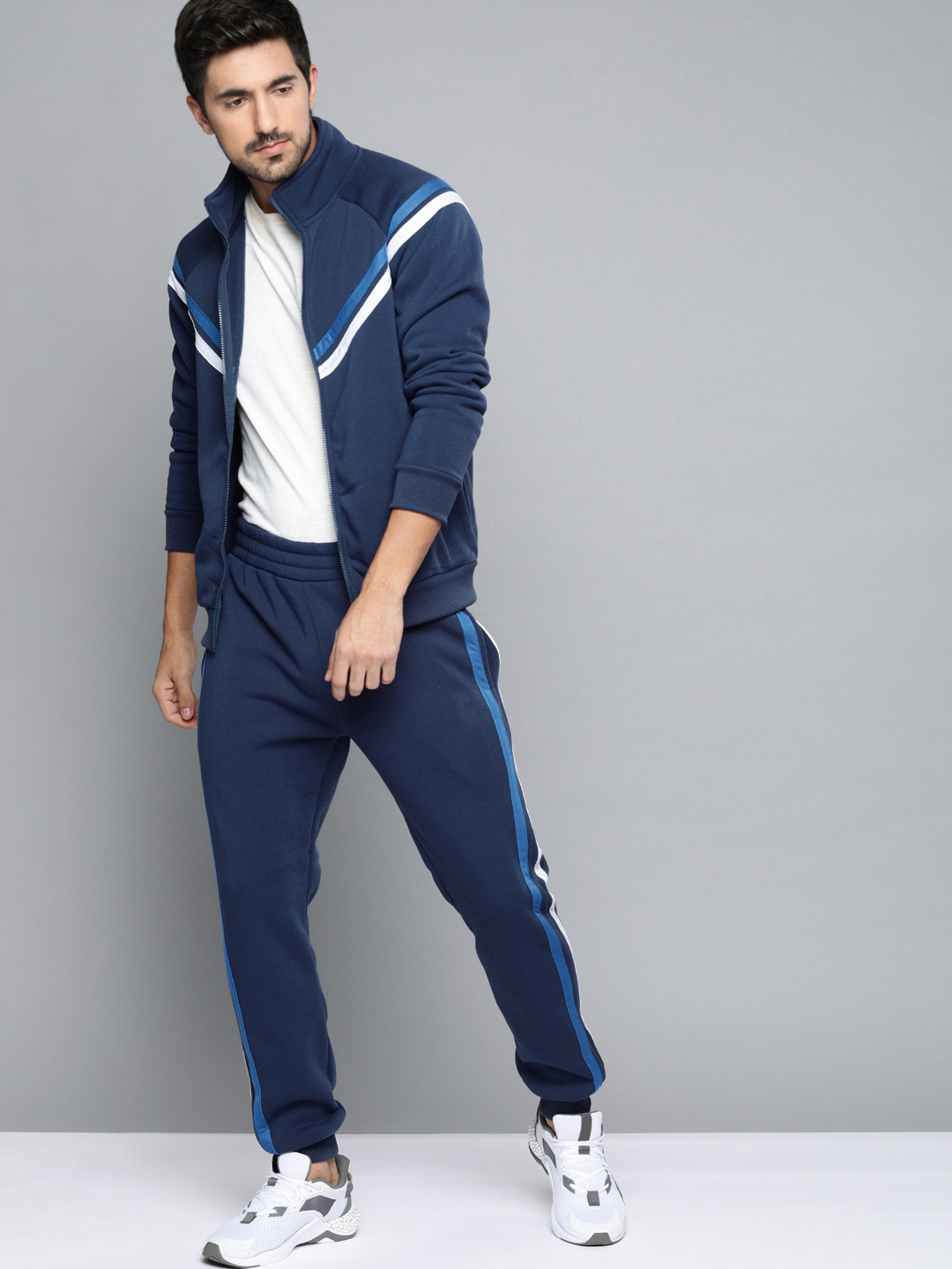 Buy HRX By Hrithik Roshan Men Navy Blue Solid Regular Fit Rapid Dry