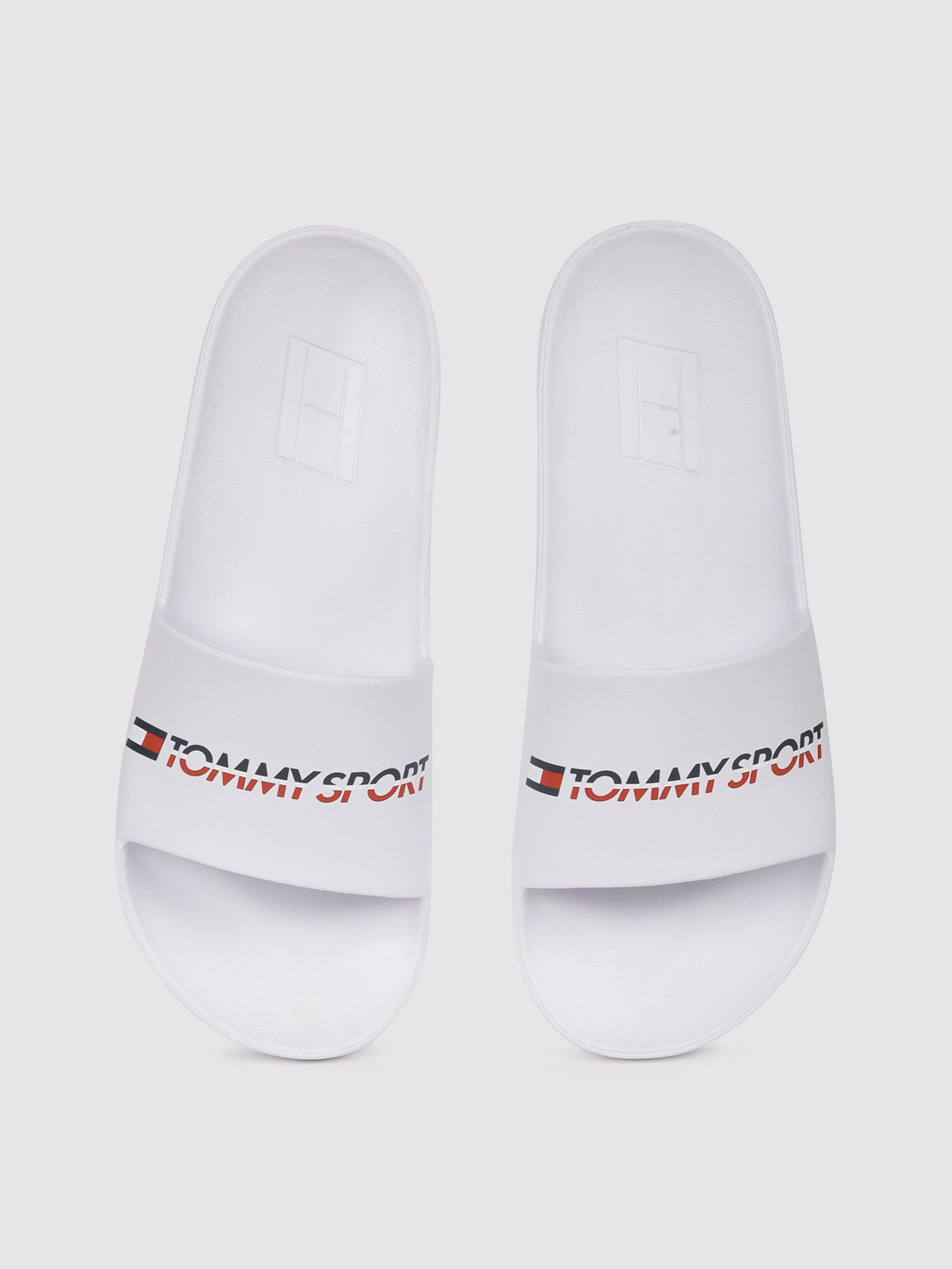 Buy Tommy Hilfiger Men White Printed Sliders - Flip Flops for Men 12449066 | Myntra
