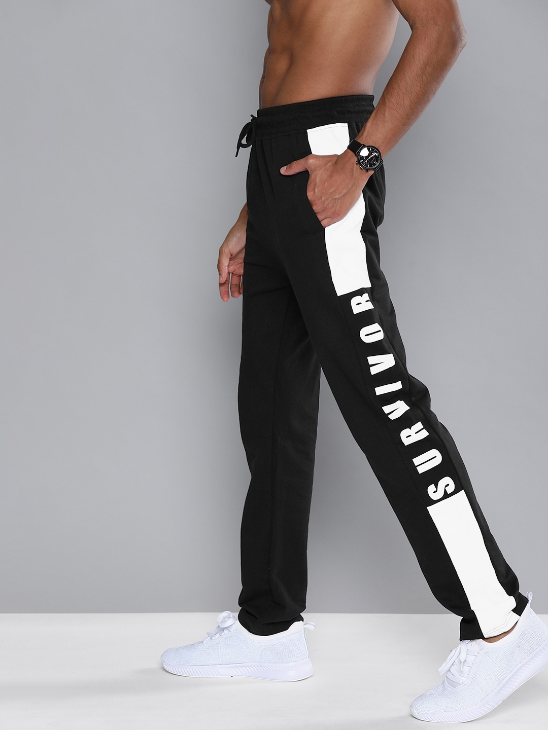 men's black track pants with white stripe