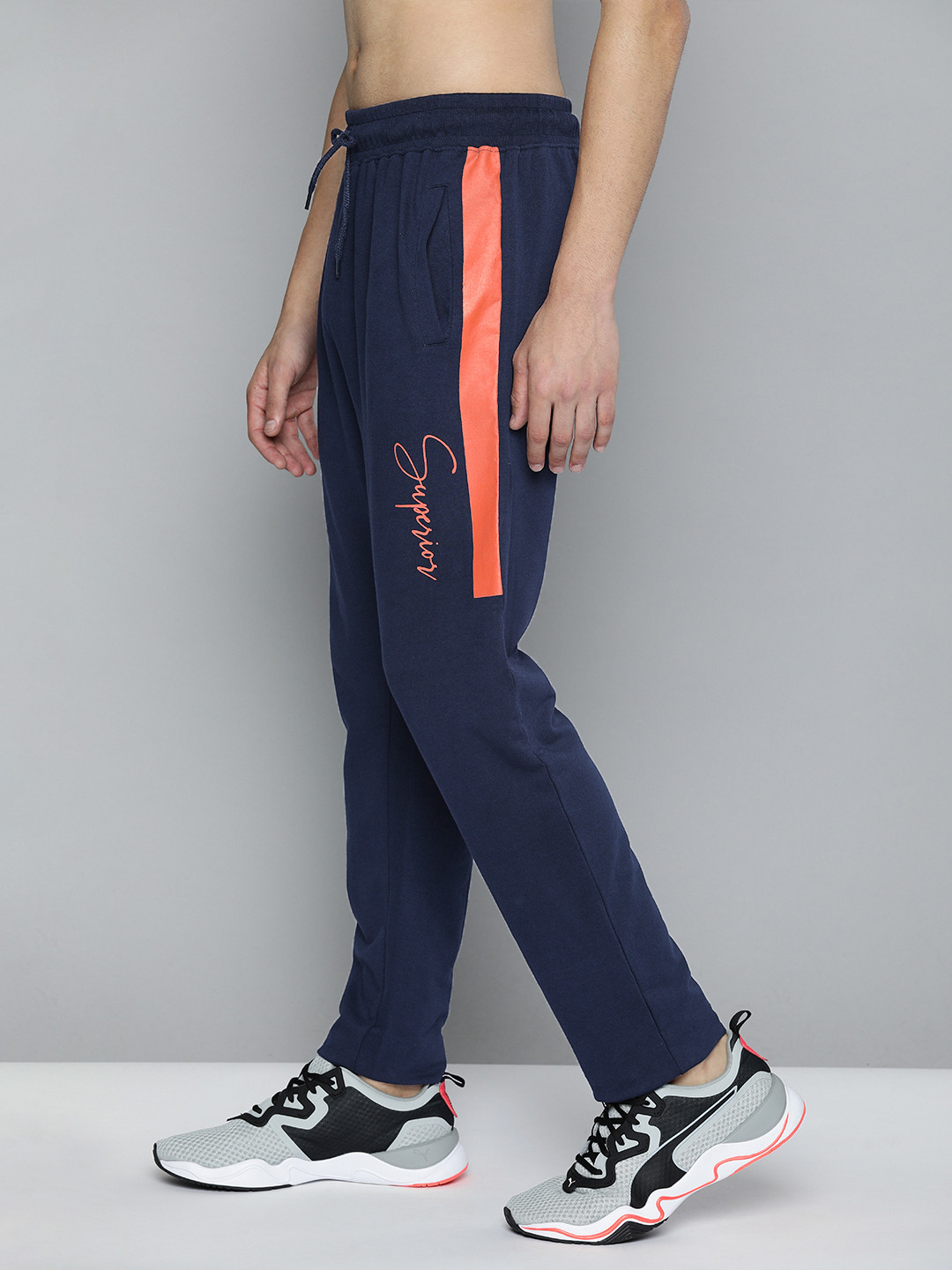 Buy HERE&NOW Men Navy Blue And Orange Printed Track Pants Track Pants