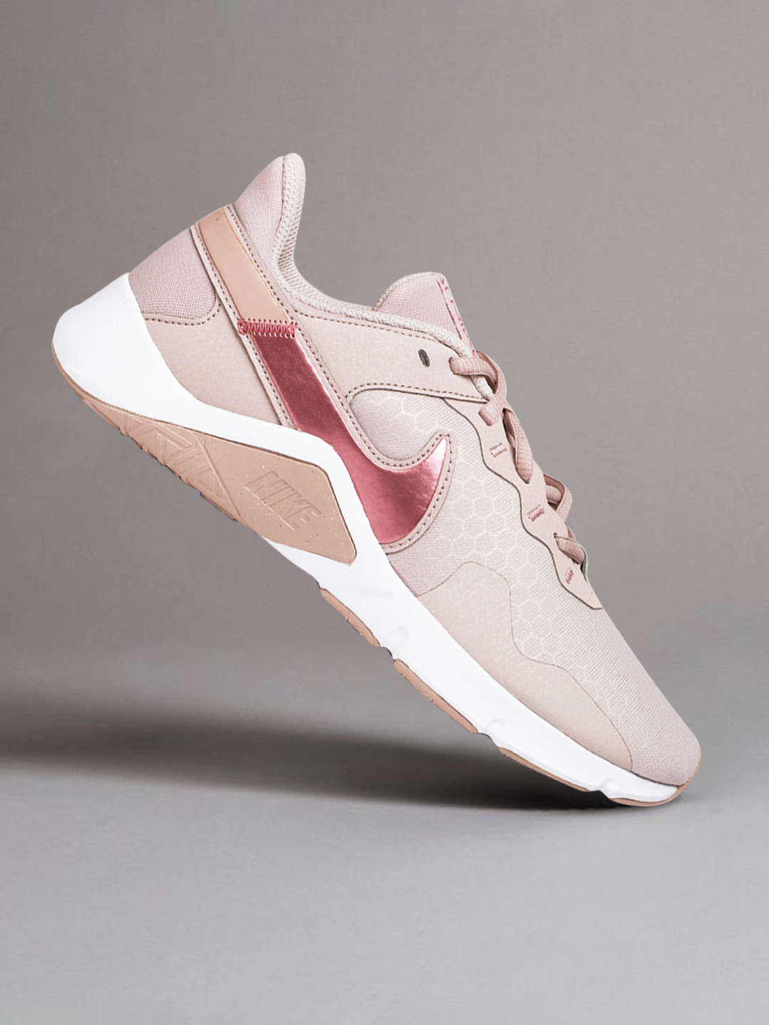 dusty pink nike shoes