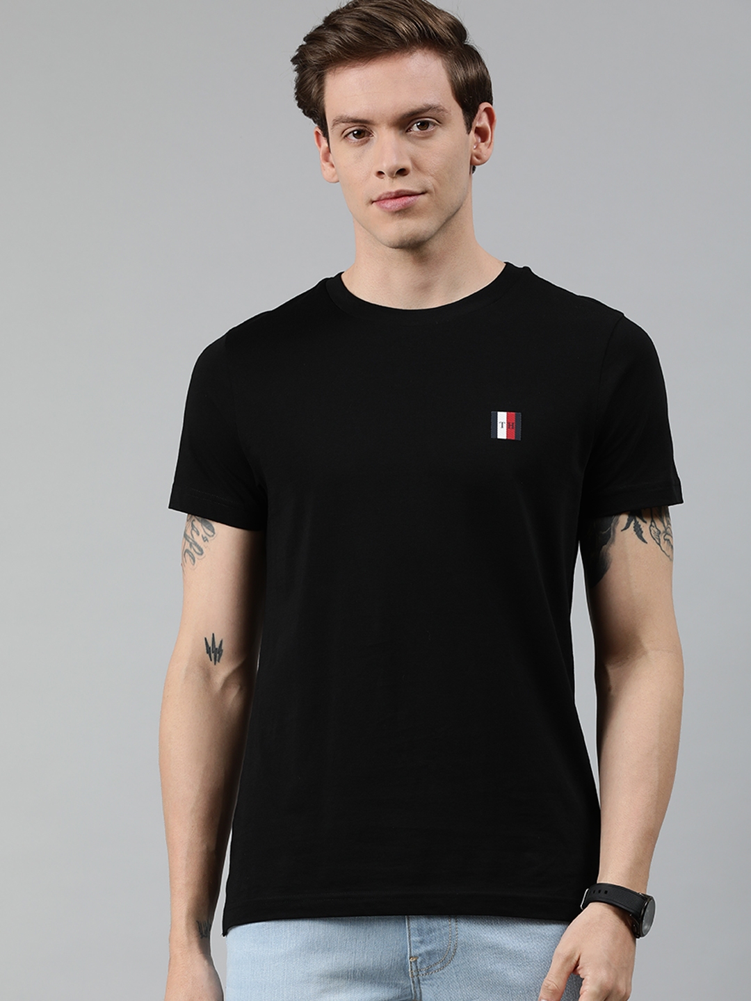 Buy Tommy Hilfiger Men Black Solid Round Neck Pure Cotton T Shirt With ...