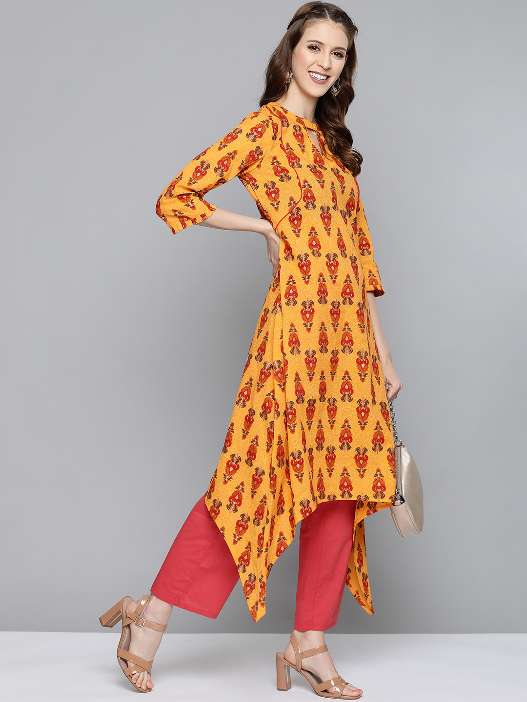 Buy HERE&NOW Women Mustard Yellow & Orange Printed Asymmetric A Line Kurta Kurtas for Women