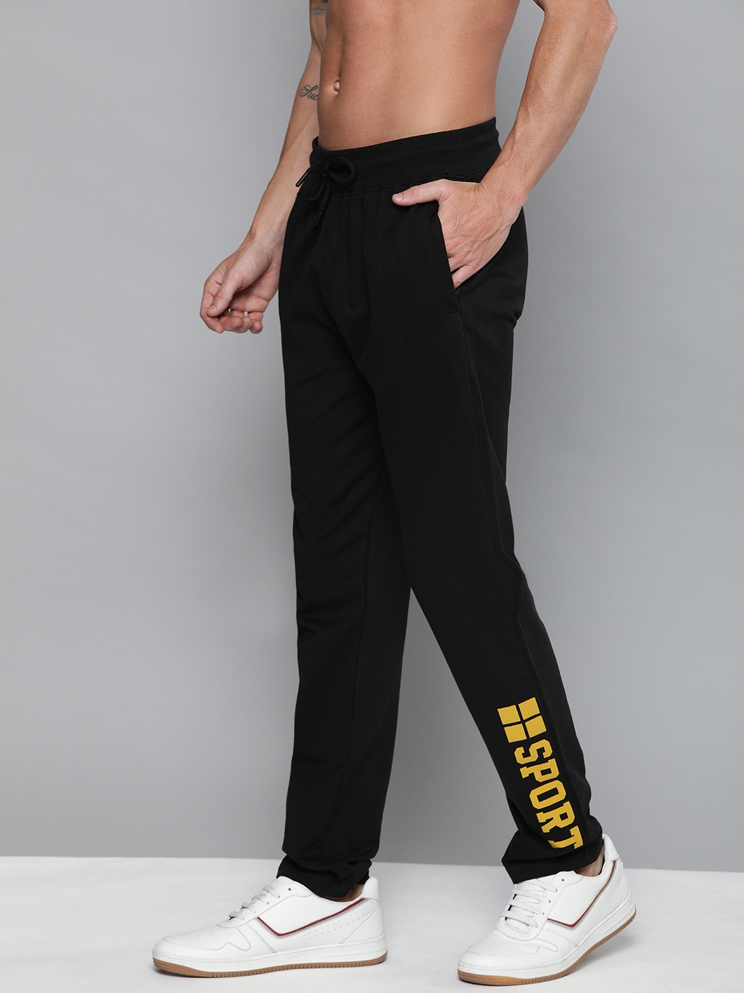 mustard track pants