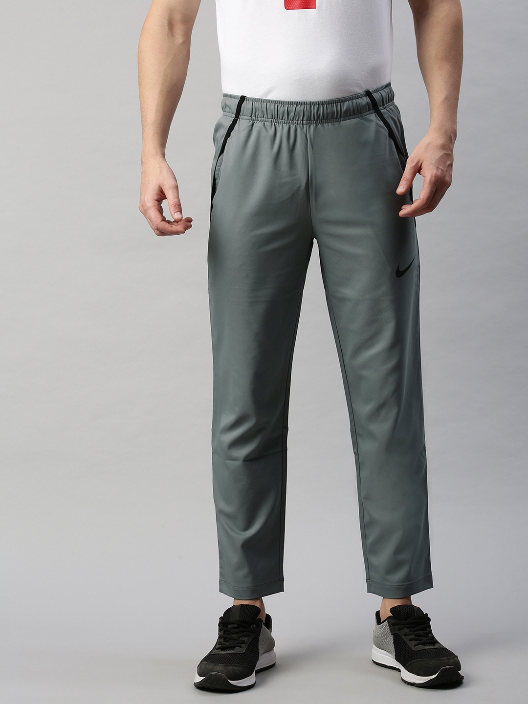 nike woven track pants grey