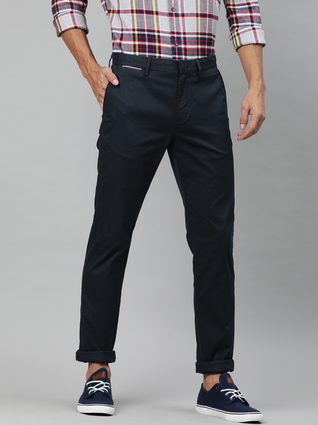Buy Tommy Hilfiger Men Navy Blue Regular Fit Solid Regular Trousers ...