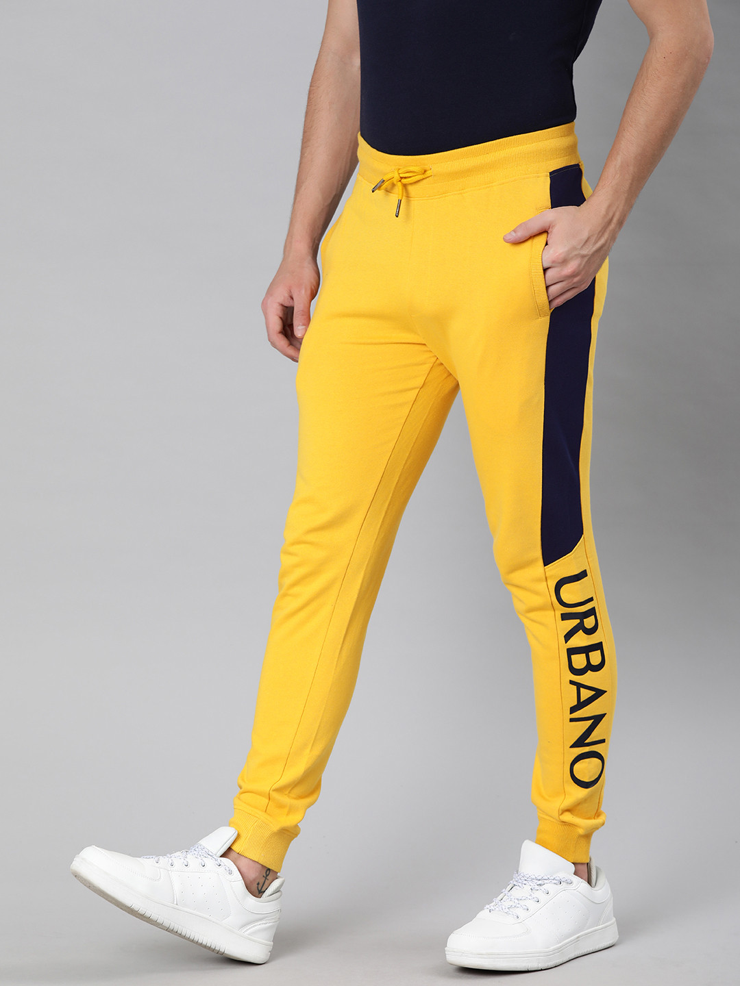 Buy Urbano Fashion Men Yellow Solid Slim Fit Joggers With Side Stripes