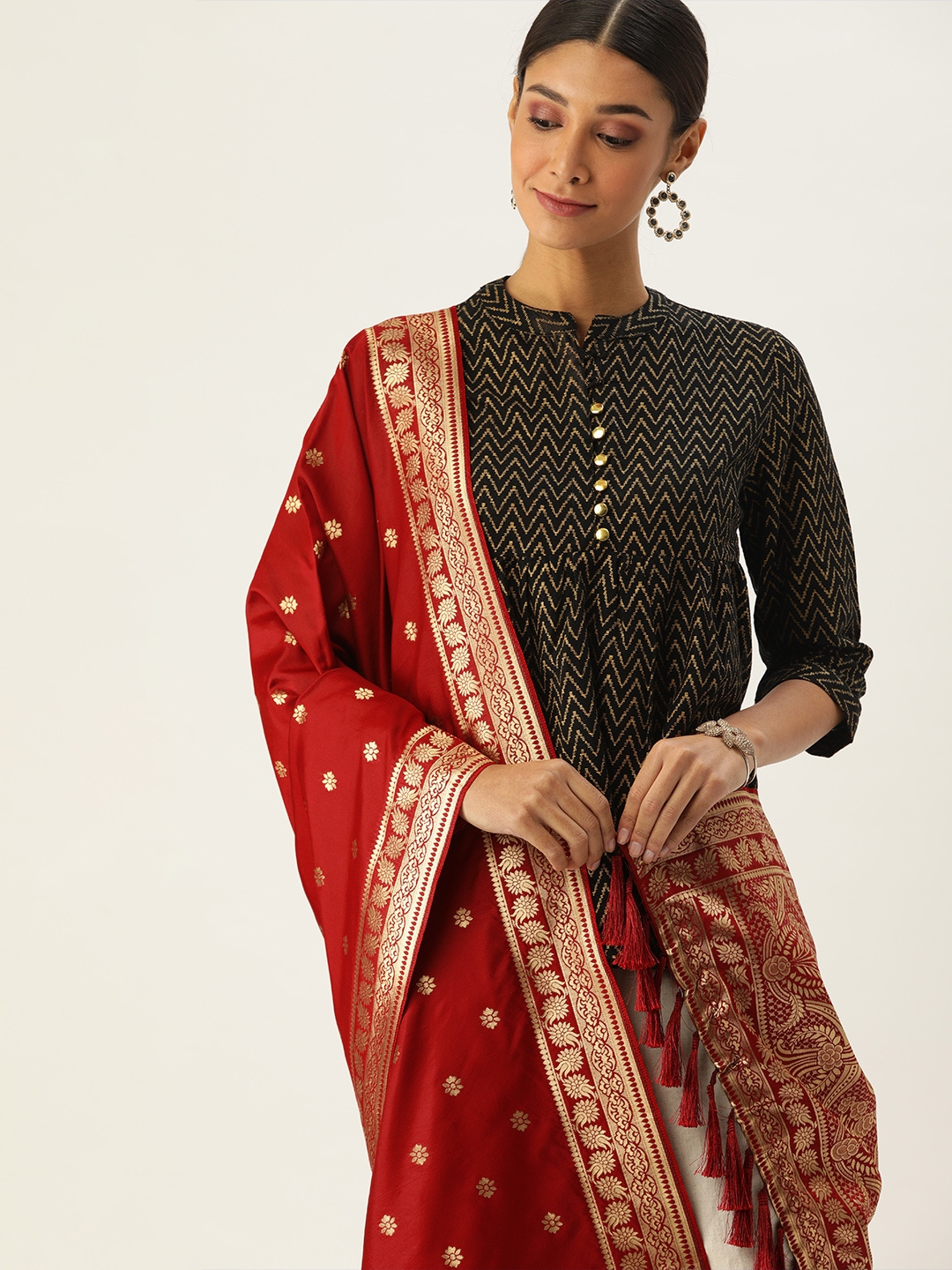 golden gown with red dupatta
