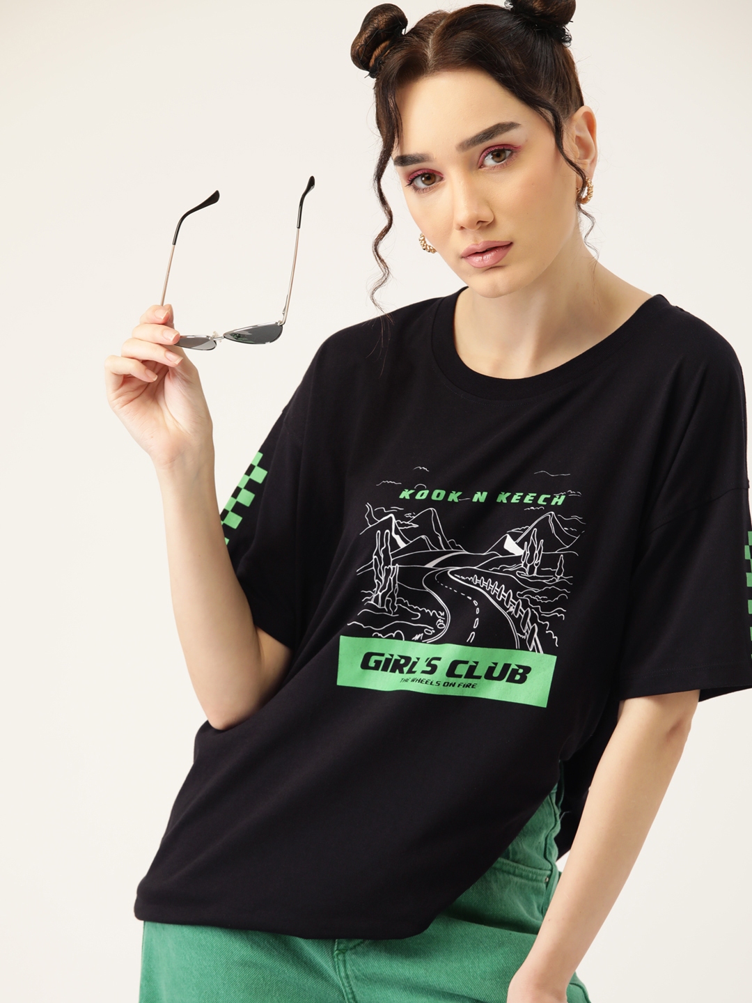 black t shirt green pants