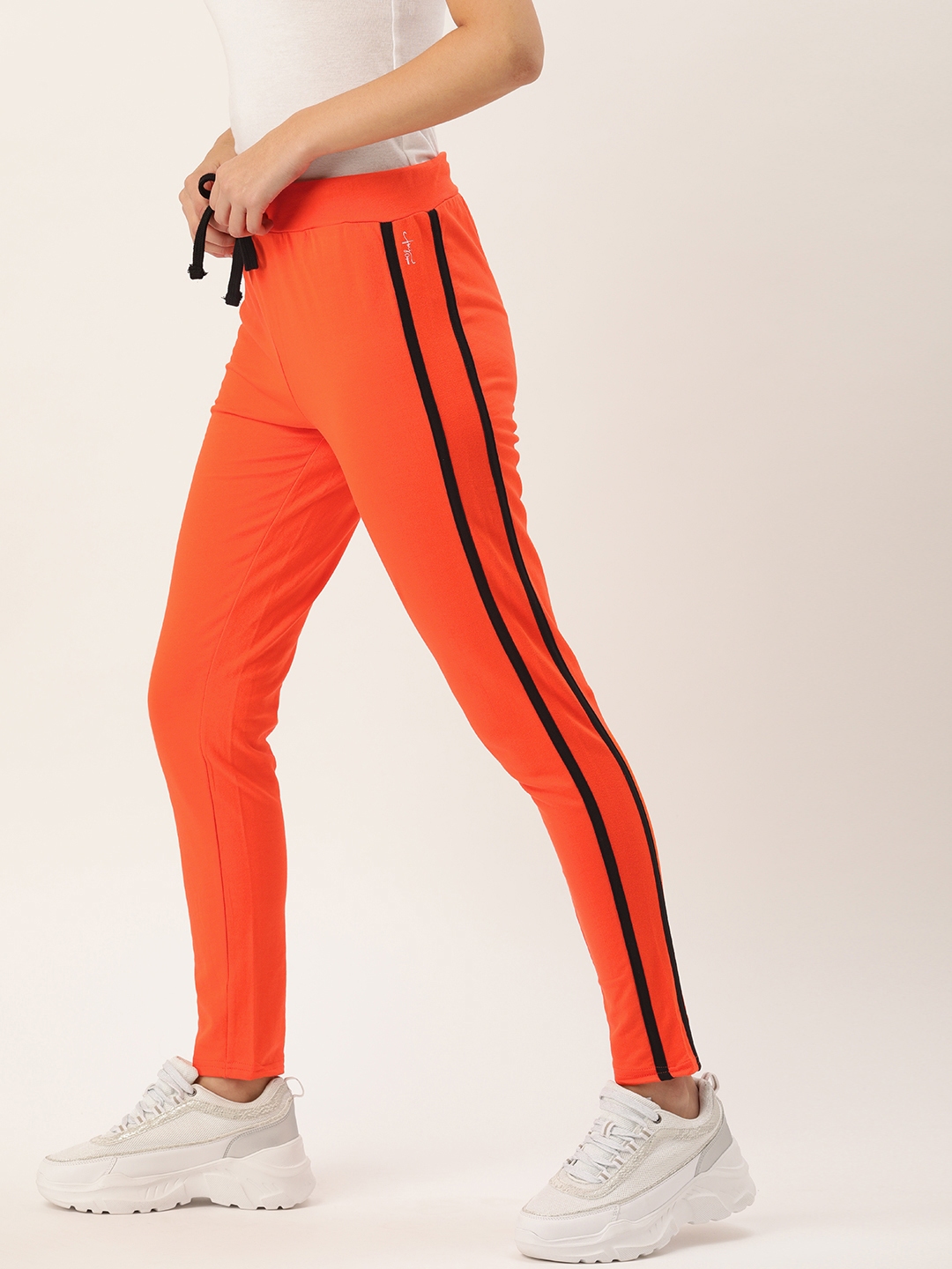 orange track pants