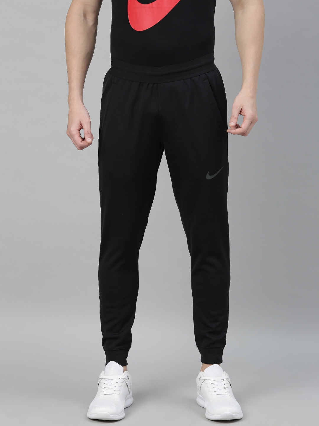 Buy Nike Men Black Solid AS M THRMA SPHR Repel Training Joggers - Track ...
