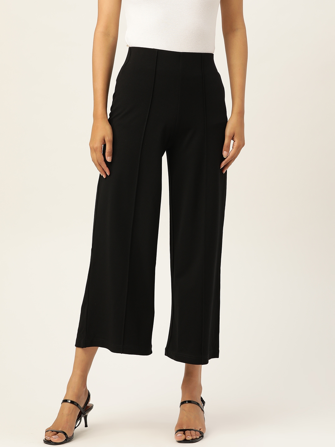 Buy AND Women Black Regular Fit Solid Cropped Parallel Trousers ...