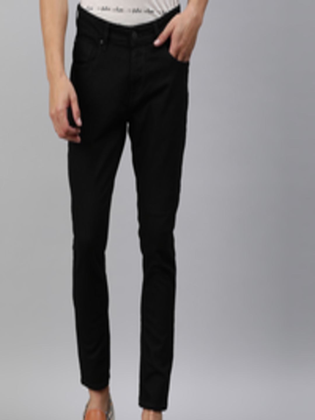 Buy SPYKAR Men Black Slim Fit Mid Rise Clean Look Stretchable Jeans ...