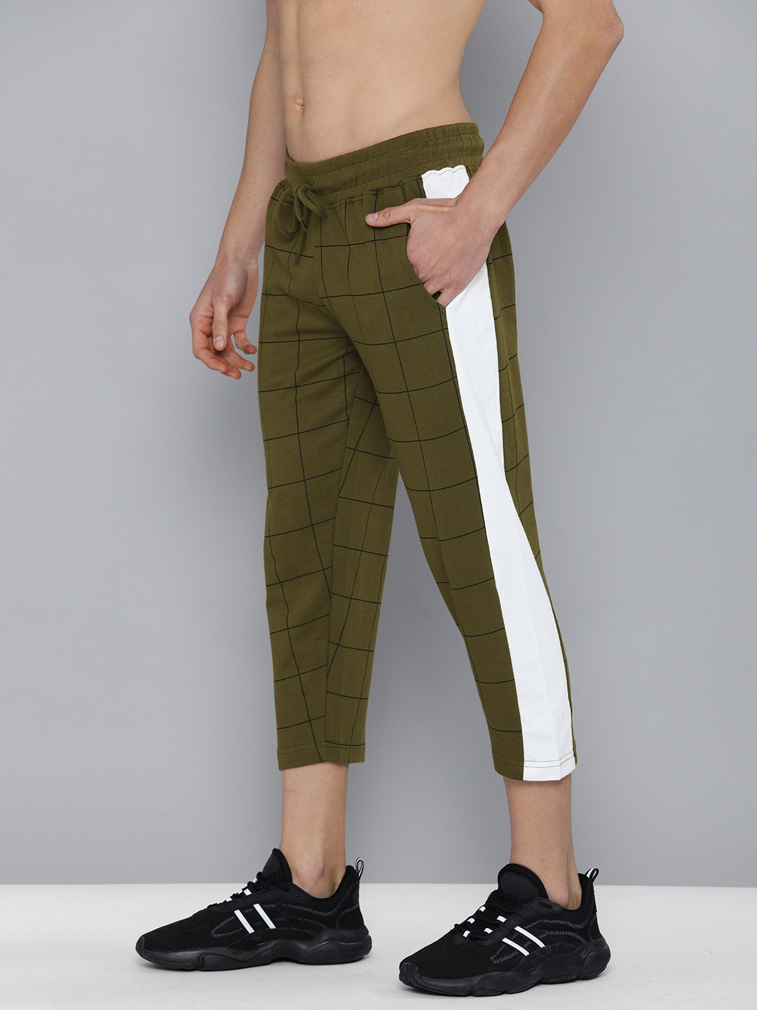 black and neon green track pants