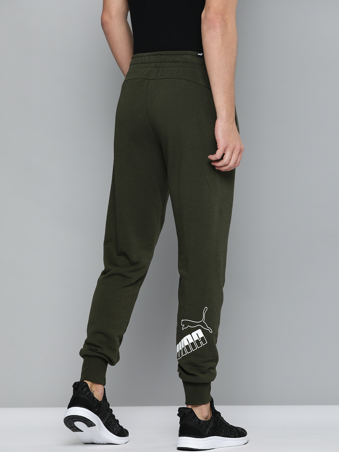 green puma golf pants