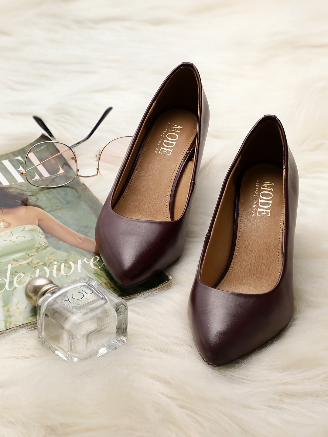 mode by red tape pumps
